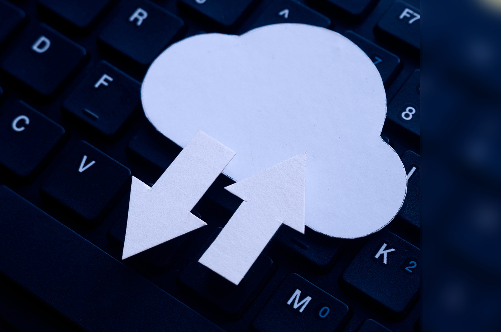 Cloud icon on a keyboard with up and down arrows for the Epic Fusion Backup Service Checklist for M365 Data
