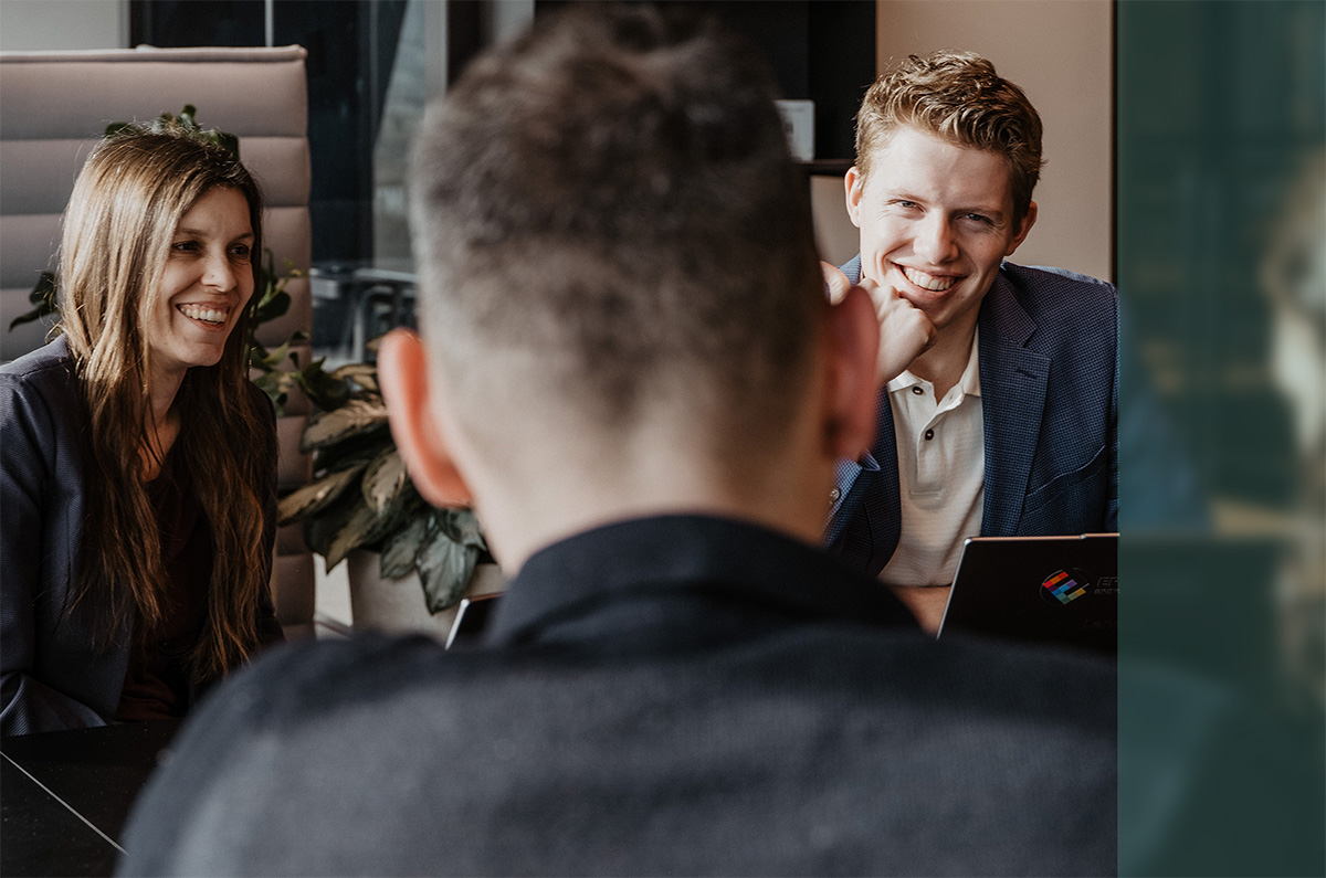 The Epic Fusion Team in a meeting with clients about Microsoft technology.